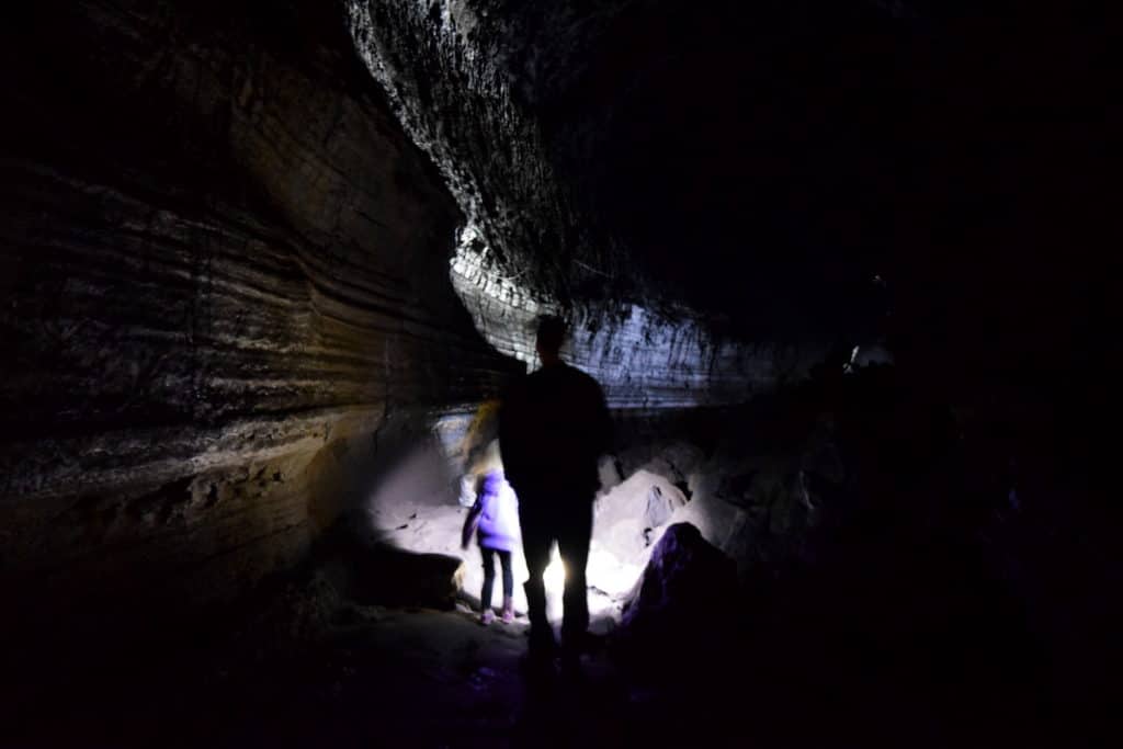Planning family travel to Central Oregon? Make sure to visit Lava River Cave, near Bend, OR, to hike in an underground lava tunnel! To & Fro Fam
