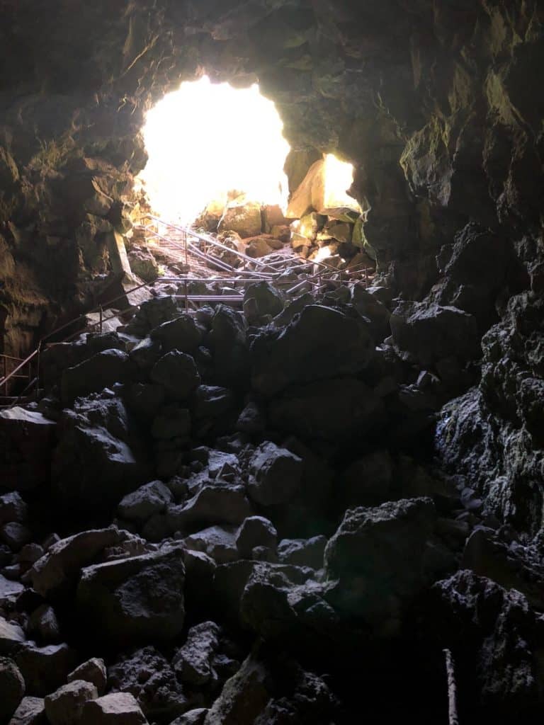 Planning travel to Central Oregon? Make sure to visit Lava River Cave, near Bend, OR, to hike in an underground lava tube! To & Fro Fam