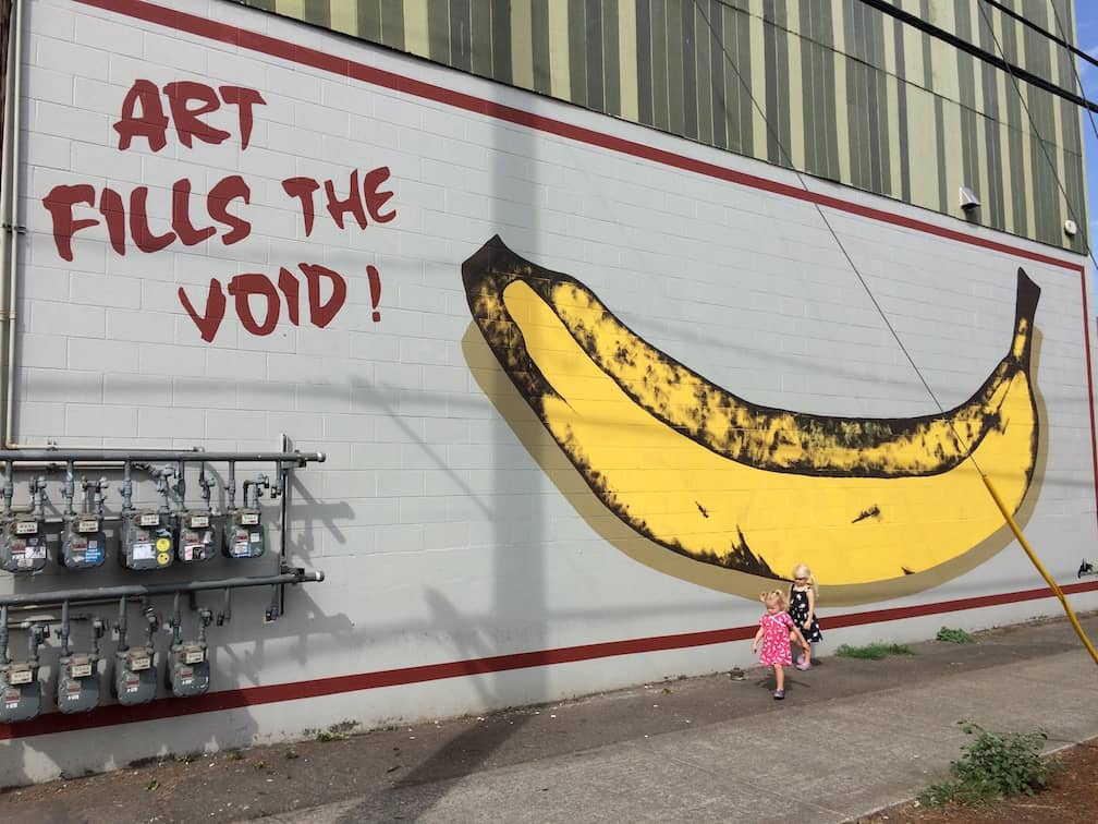 Weird things to do in Portland with kids, like the giant banana mural! To & Fro Fam