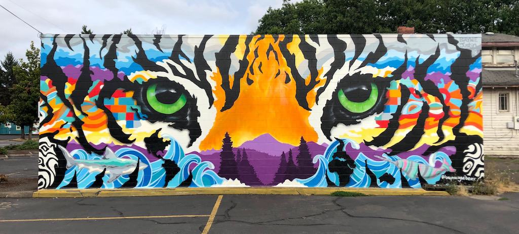 Street art in Eugene, Oregon: This tiger mural is behind Falling Sky Brewery. Microbrews and murals—a great combination! To & Fro Fam
