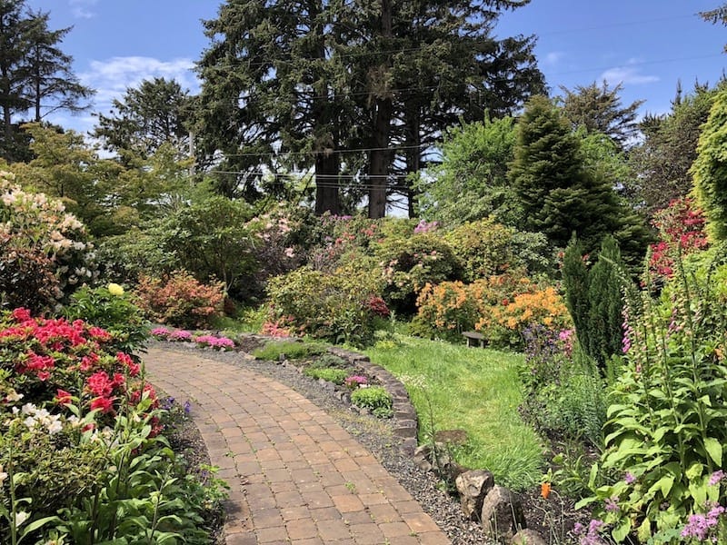 Things to do in Lincoln City, Oregon: Walk the paths and smell the flowers at the Connie Hansen Garden, a hidden gem on the Oregon Coast. To & Fro Fam
