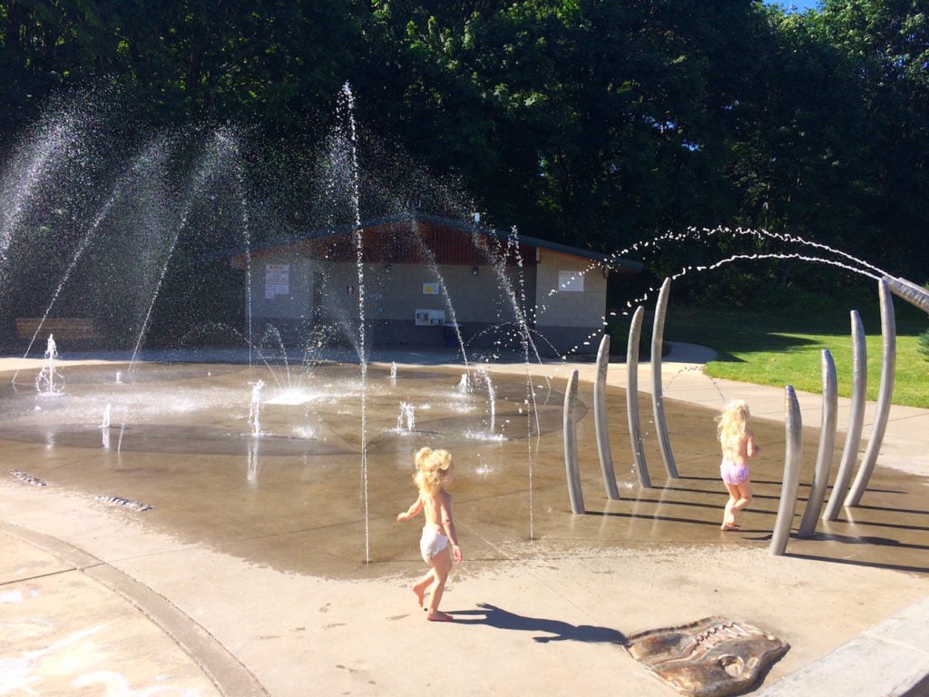 Fun outdoor things to do with kids in Portland, Oregon in the summer: Explore splash pads! Marylhurst Heights Park in West Linn has one of the most unique splash pads in the area. There are dinosaur "fossils" and "bones" as part of the outdoor fountain, plus a fun playground. To & Fro Fam