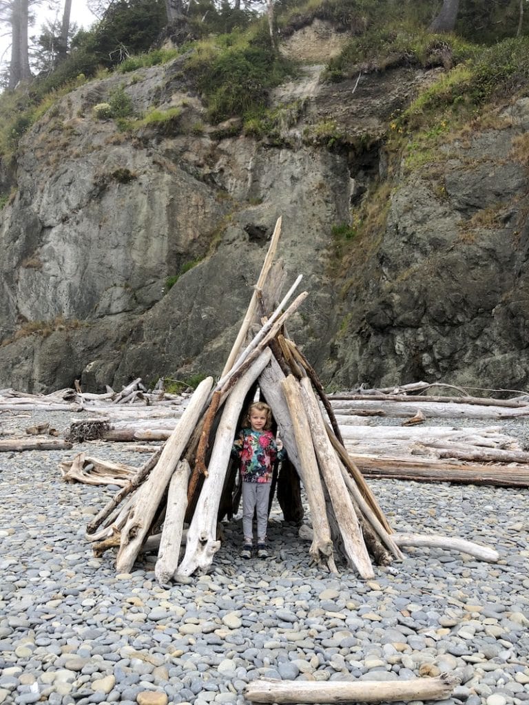 Olympic National Park in Washington is full of beautiful, kid-friendly spots. Ruby Beach near Forks, WA is one of our favorite places, especially for an Olympic National Park road trip! Plus, driftwood castles make this unforgettable for families. To & Fro Fam