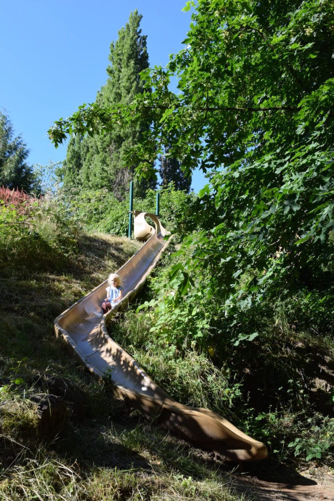 A 2-story high slide built into the side of a hill? Yes please! This fun playground in West Linn near Portland, OR is super fun for kids (and their grownups). To & Fro Fam