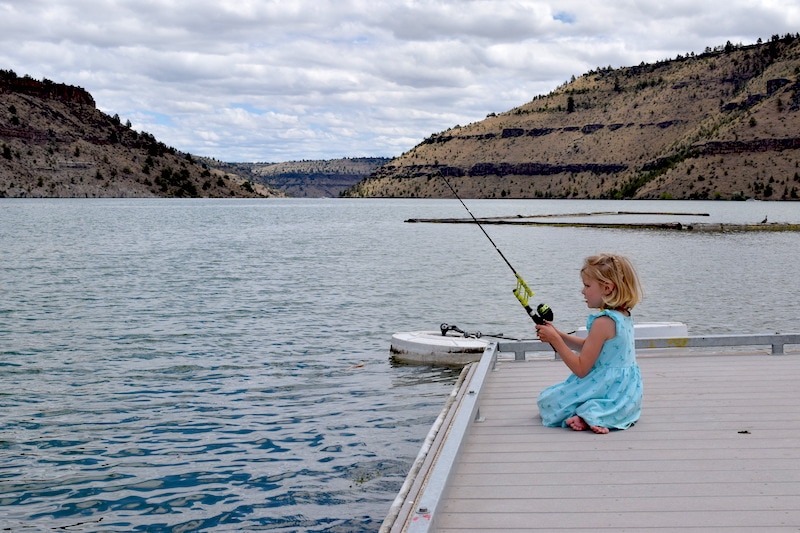 Exploring Central Oregon with kids: Things to do near Bend, OR with your family. We love Lake Billy Chinook, where you can explore an  island on the lake, swim, go camping, go fishing, hike and much more. There's even a petroglyph here! Click for all the details. To & Fro Fam