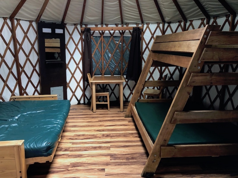 Yurt camping in Oregon: Cape Lookout State Park has yurts with electric and heat. Here's my guide to yurt camping on the Oregon Coast. Click to learn all about state park yurts, including what they look like inside, and things to do nearby. To & Fro Fam