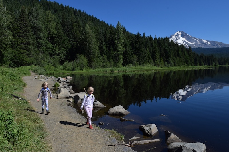 Trillium Lake hike: All the details for this kid friendly trail. It's a 2 mile loop, good for kids, on Mt. Hood. Click for details for hiking, camping, swimming, paddle boarding and more! To & Fro Fam