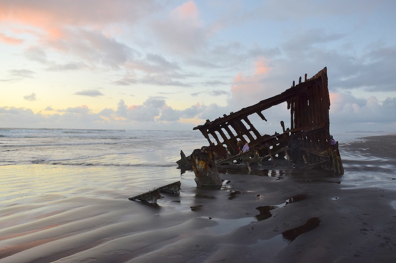 Epic Oregon Coast: Climb inside a real shipwreck in Ft Stevens State Park! Near Astoria, OR, this destination is unforgettable. To & Fro Fam