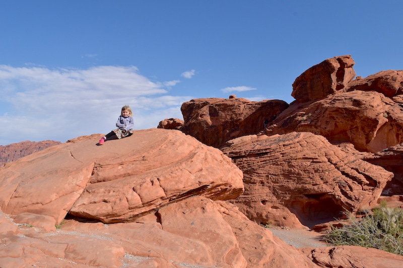 Things to do in Las Vegas with Kids: Explore Valley of Fire State Park! An easy hour drive from the Strip, your kids can climb boulders, take family-friendly hikes and even see petroglyphs. Read for all the details to make the most of your trip to Valley of Fire! To & Fro Fam 