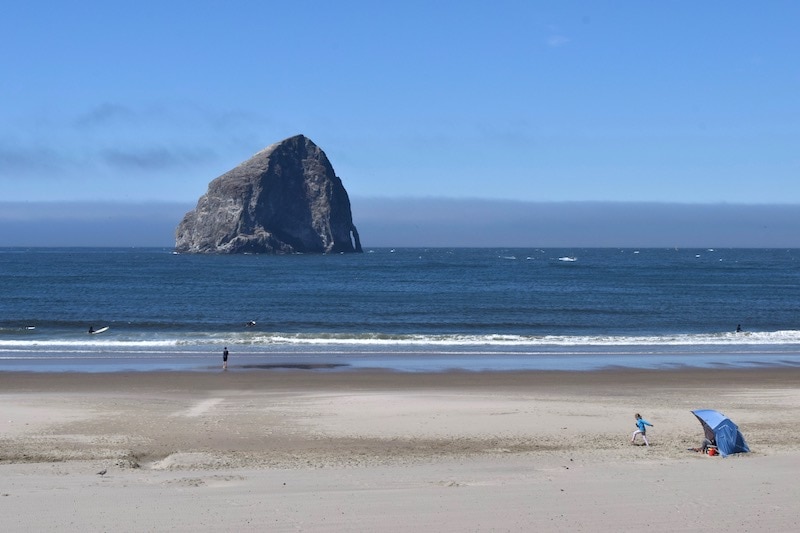 Beautiful Haystack Rock in Pacific City, Oregon: One of the prettiest landmarks on the Oregon Coast. To & Fro Fam